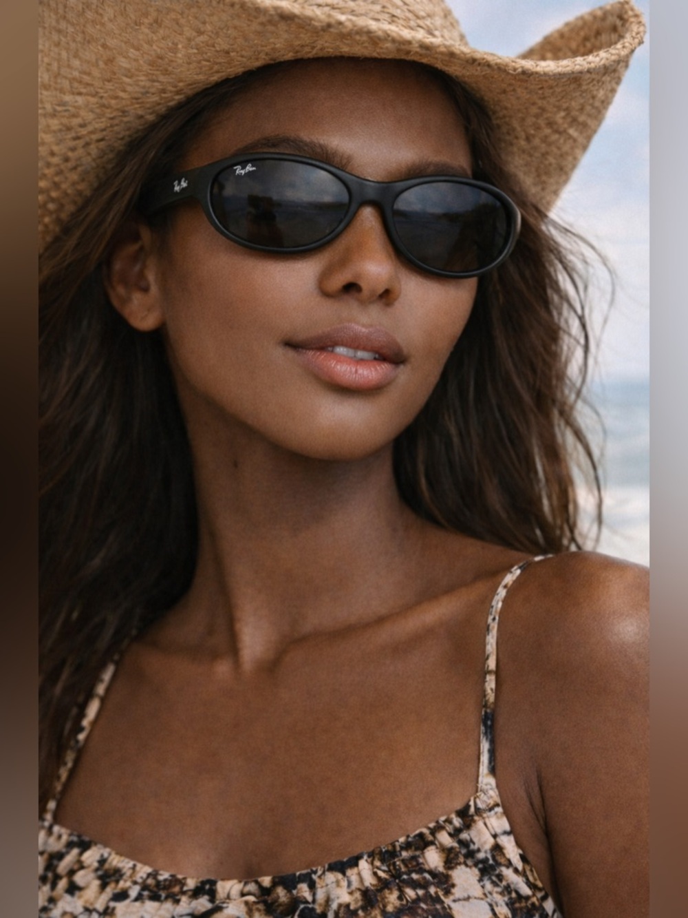 Ray-Ban Black Frame Sunglasses with Dark Lenses and Maui Jim Case